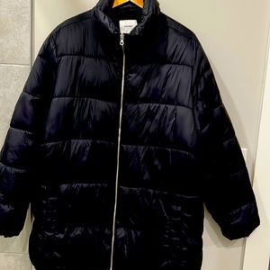 Warm puffer jacket. Excellent condition. Has pockets but no hood.